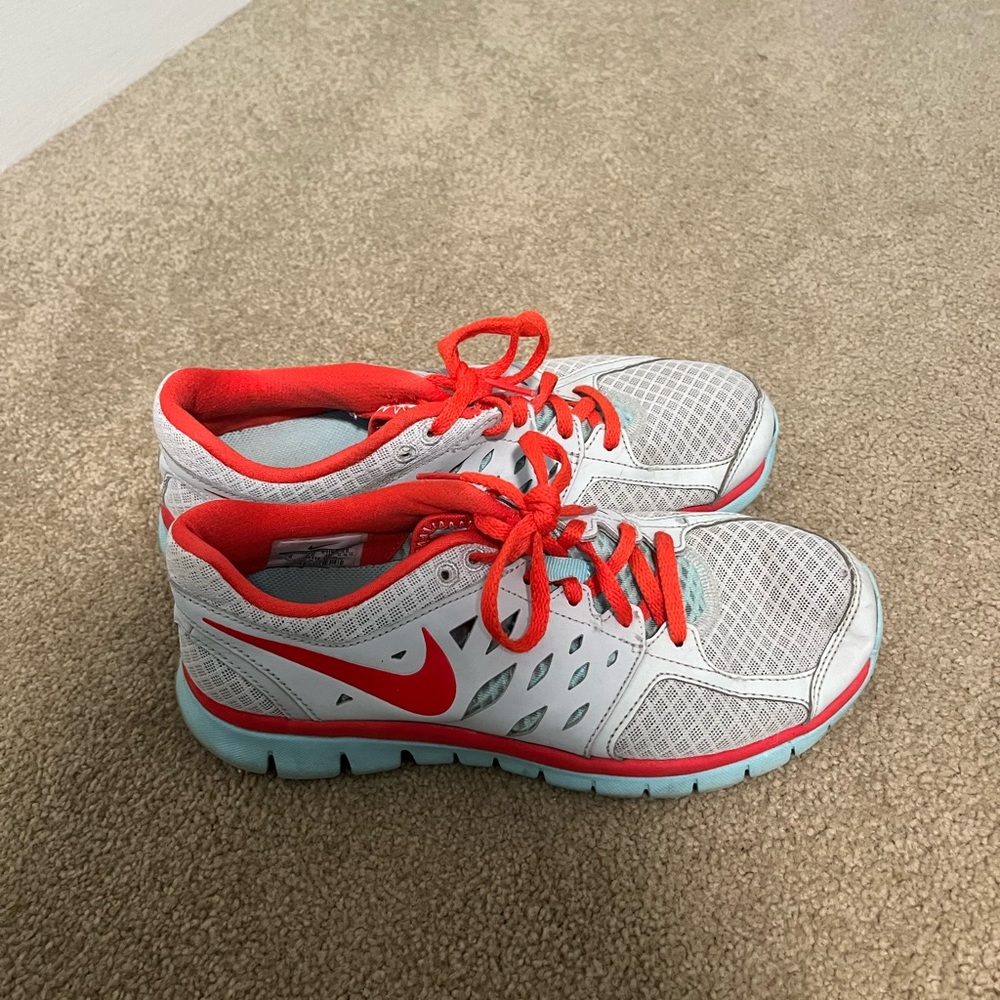 Nike running shoes red and blue and grey size 8